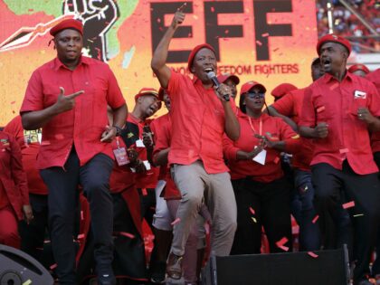 FILE - Leader of the Economic Freedom Fighters (EFF) party, Julius Malema, centre, with pa